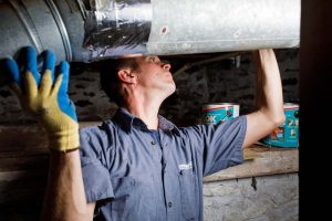 HVAC Technician on an install